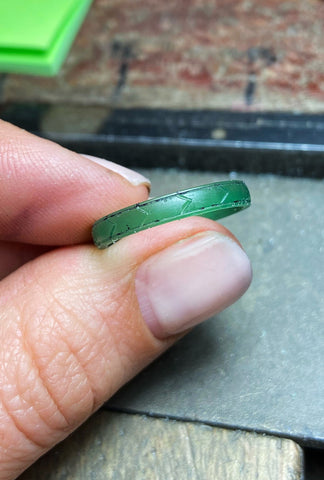 The beginning stages of a lost wax ring carving