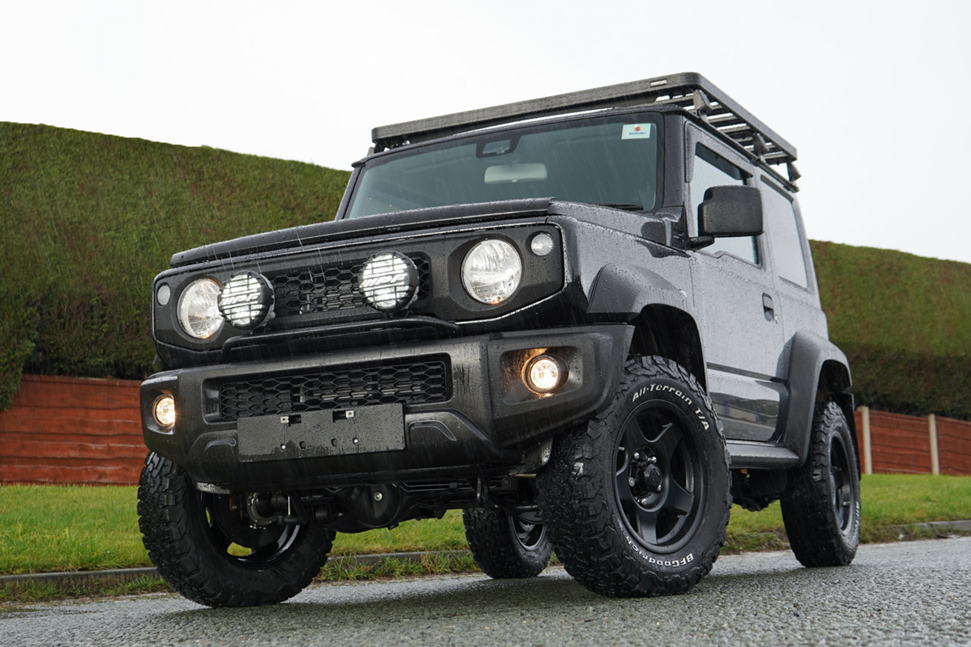 Black Suzuki Jimny with accessories, wheels and tyres fitted by Street Track Life JimnyStyle