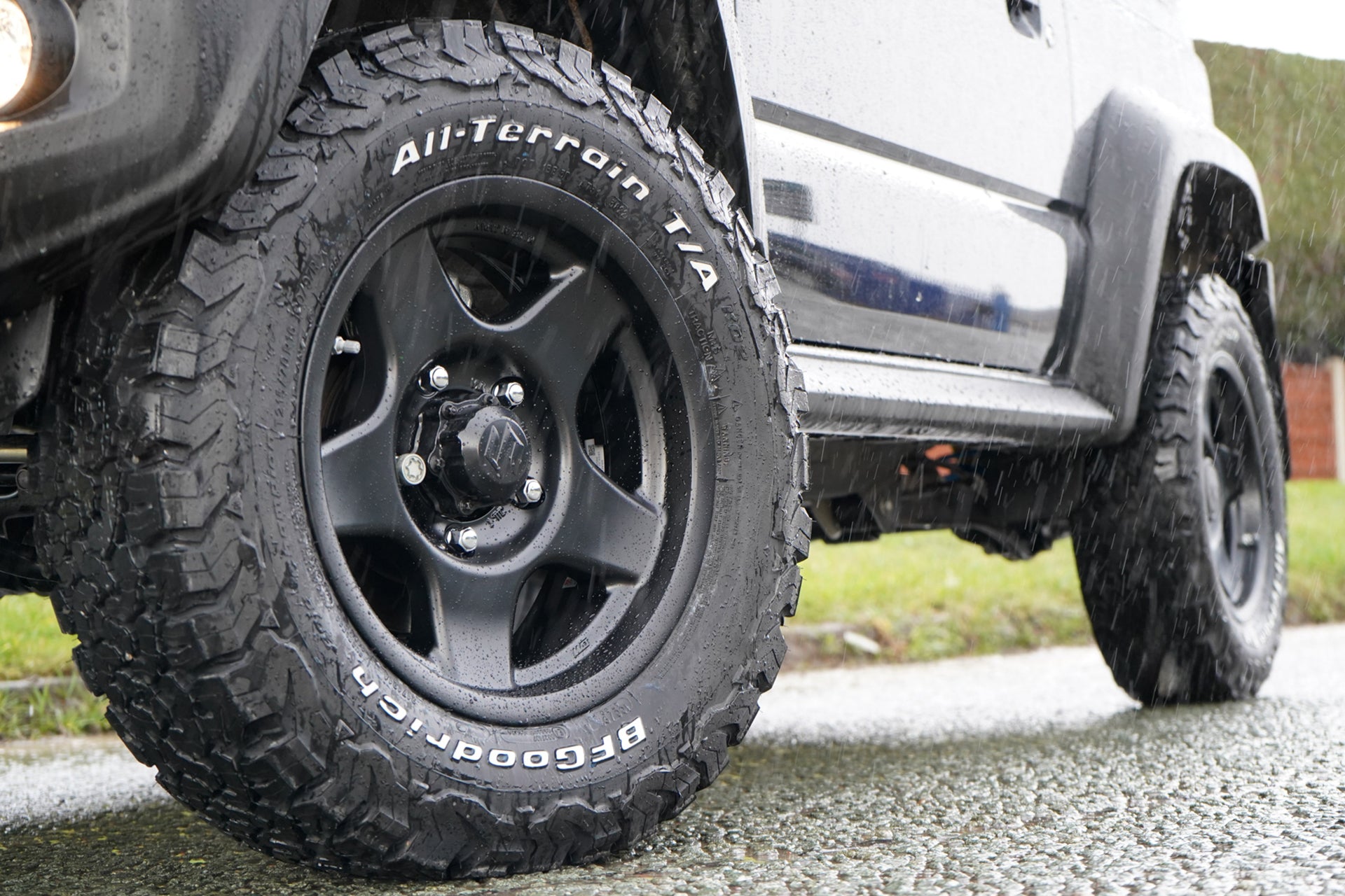 Black Suzuki Jimny with BRADLEY V wheels and BF Goodrich tyres fitted by Street Track Life JimnyStyle