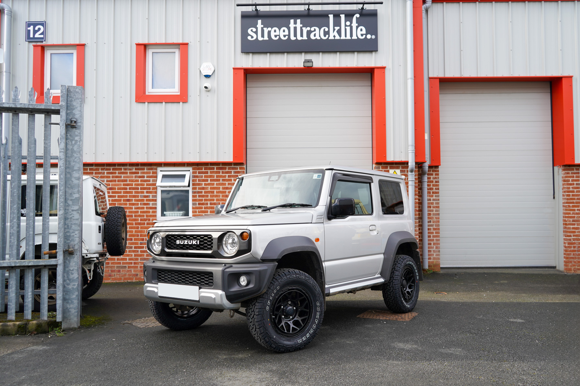 Silver Jimny with Magpie M-10 Wheels fitted at JimnyStyle Street Track Life