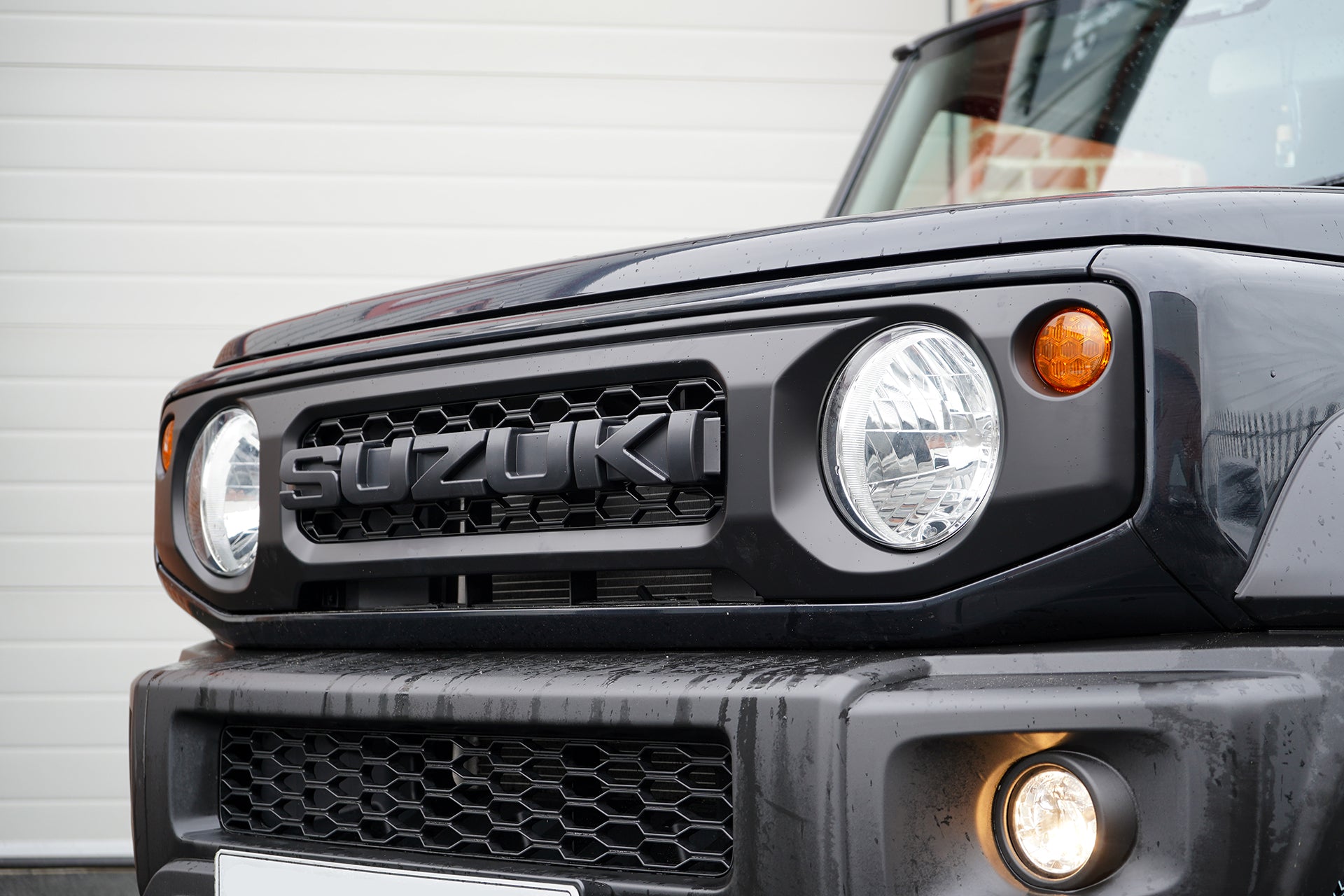 Suzuki Jimny with a Retro Grille and Tactical Grille Badge Street Track Life JimnyStyle