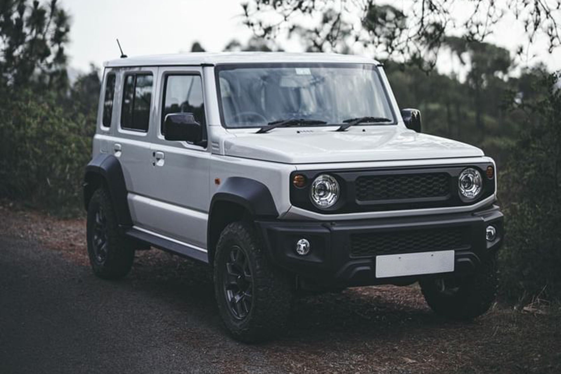 5 door Suzuki Jimny with JimnyStyle Retro Front Grille Street Track Life