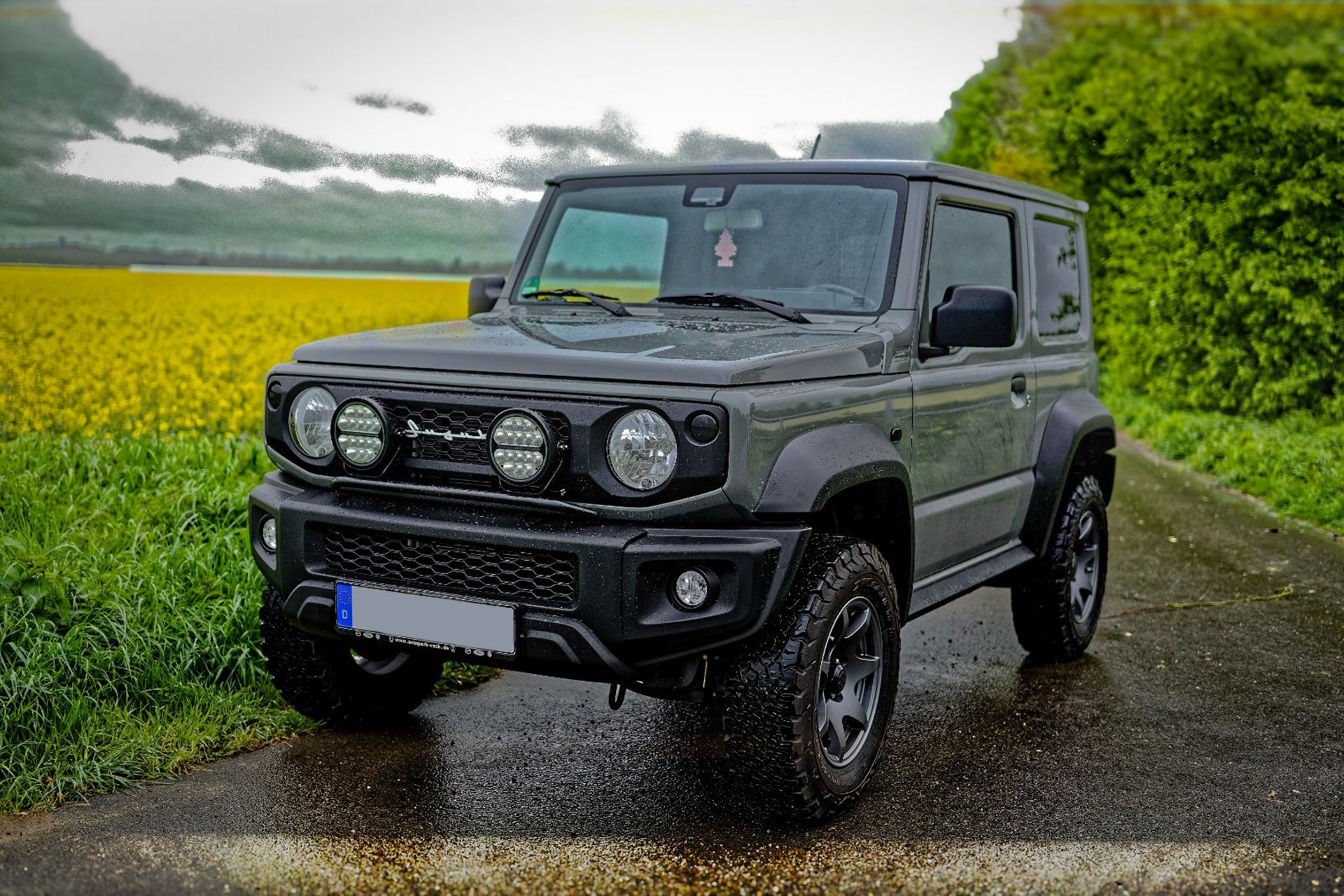 Suzuki Jimny (2018+) with HIGH PEAK J-02 15 inch wheels with a Retro Front Grille and JimnyStyle Smoked LED Lights and other accessories from Street Track Life JimnyStyle