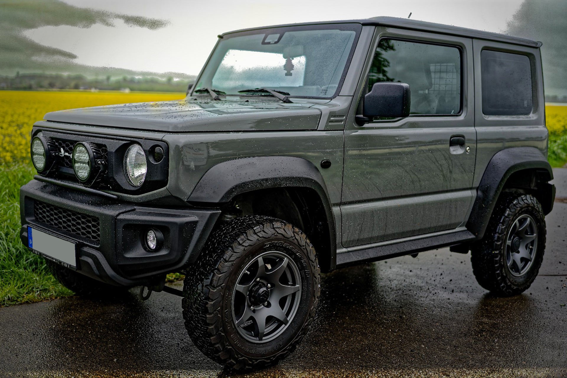 Suzuki Jimny (2018+) with HIGH PEAK J-02 15 inch wheels with a Retro Front Grille and JimnyStyle Smoked LED Lights and other accessories from Street Track Life JimnyStyle