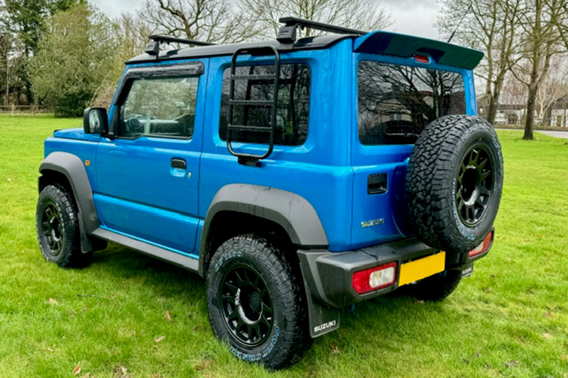 Suzuki Jimny with EVOCorse Dakar Zero Wheels and Front Runner Load Bars Supplied by Street Track Life JimnyStyle