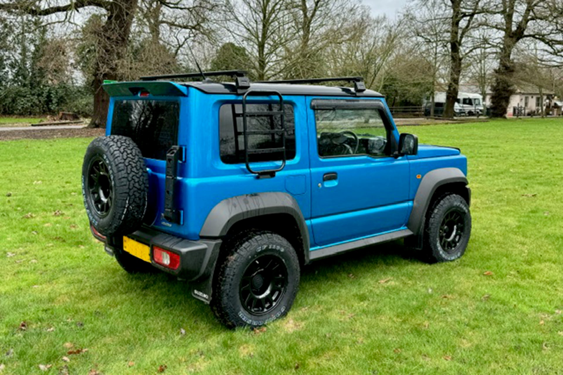 Suzuki Jimny with EVOCorse Dakar Zero Wheels and Front Runner Load Bars Supplied by Street Track Life JimnyStyle