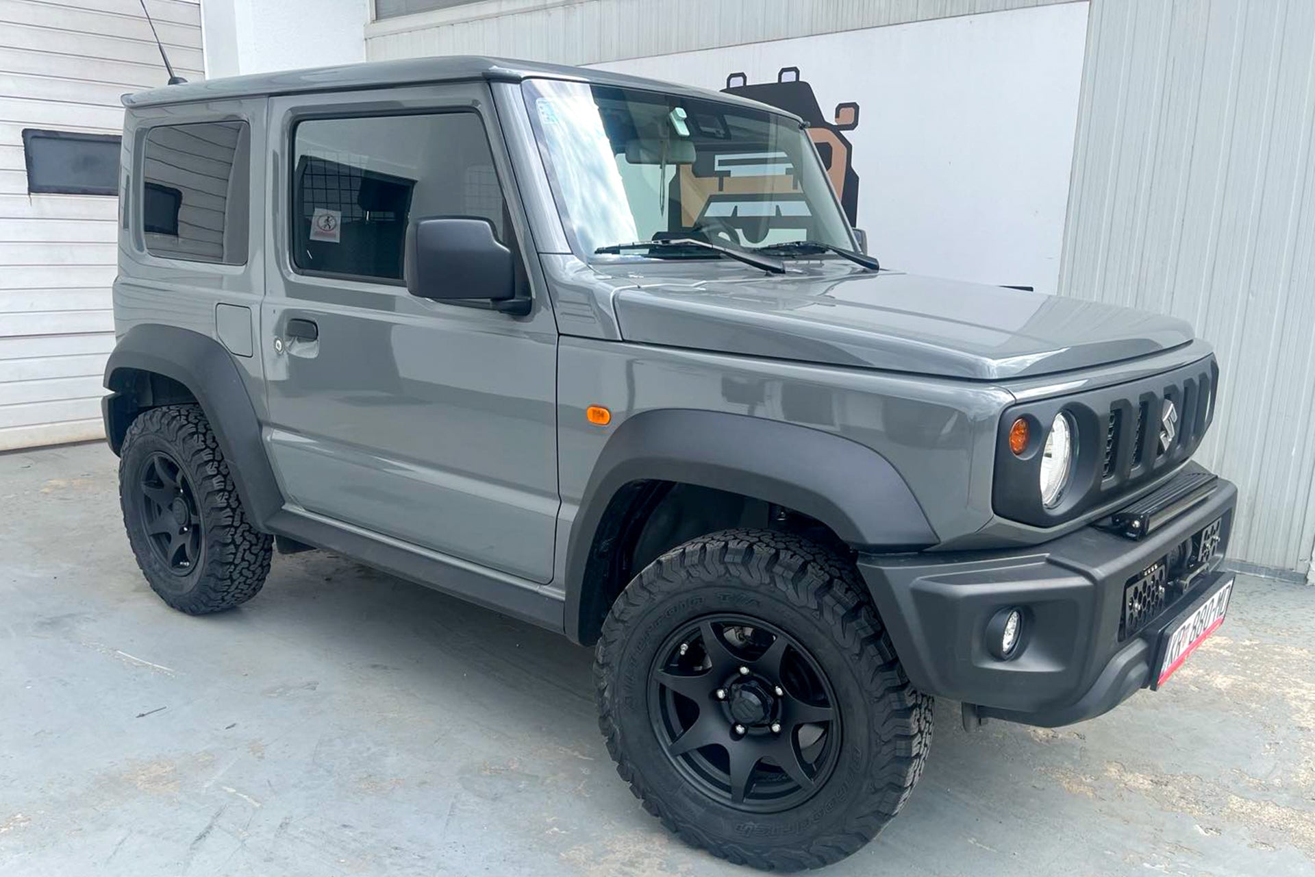 Suzuki Jimny (2018+) with HIGH PEAK J-02 wheels in Matte Black.