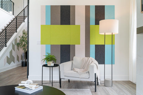 green and blue square felt panels with lamp and chair