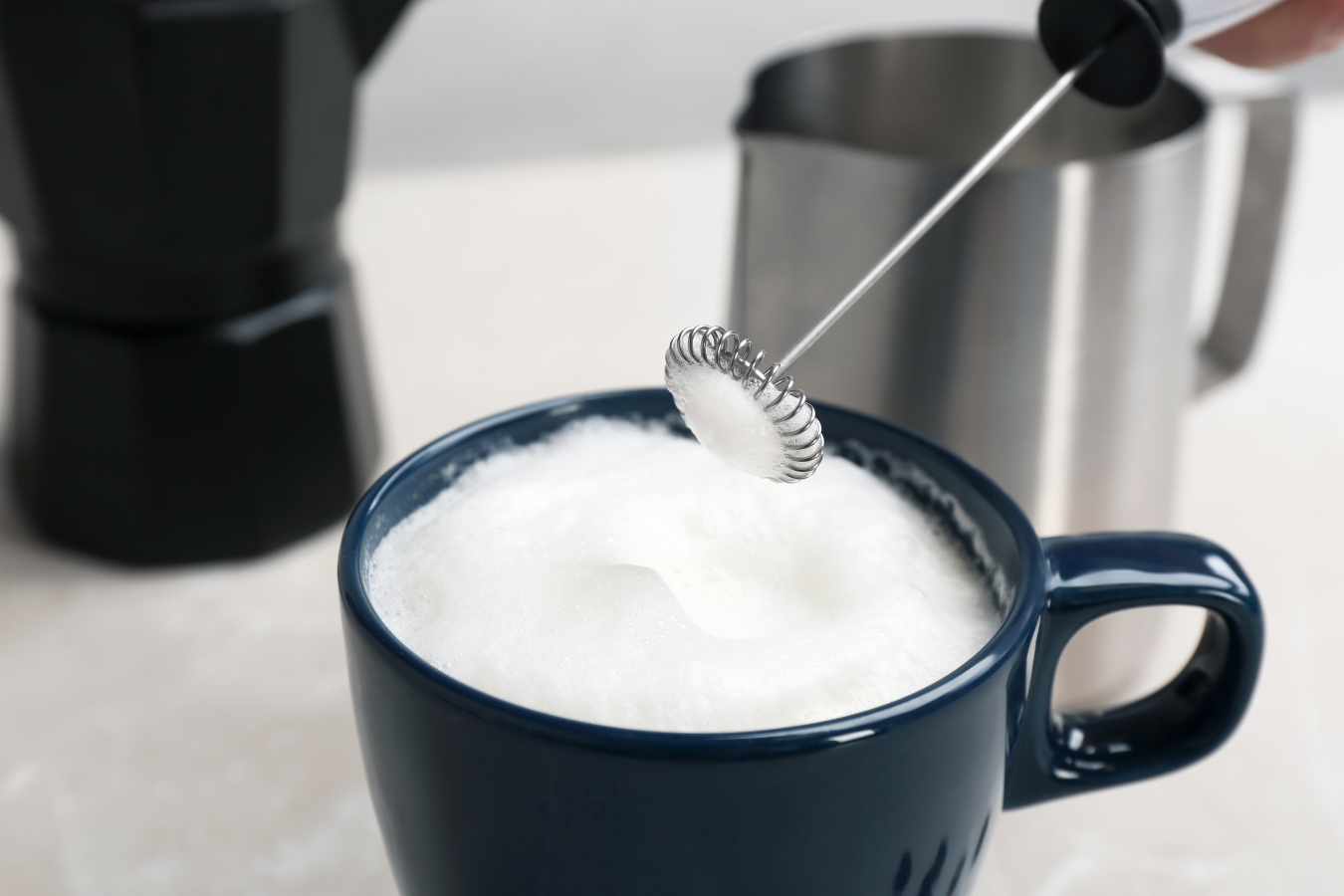 Making cold foam using a milk frother.