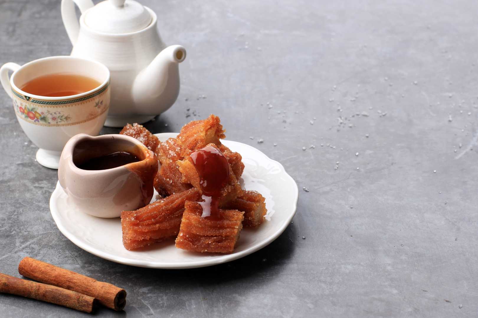 Mini Churros with chocolate dip and a tea.