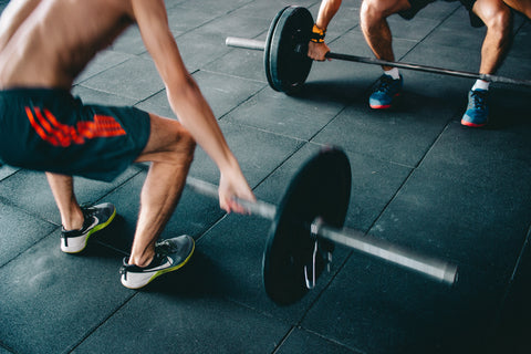 Man Lifting Barbell