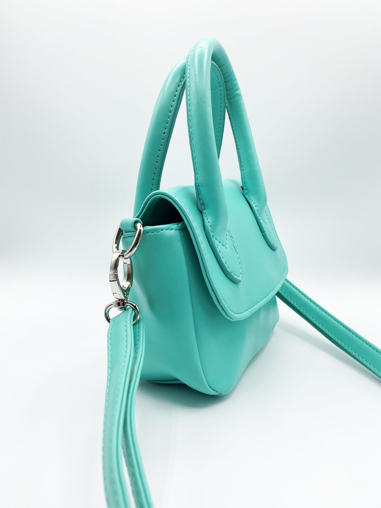 SVNX Nia Aqua Blue Mini Bag With Top Handle And Cross Body Strap – svnx