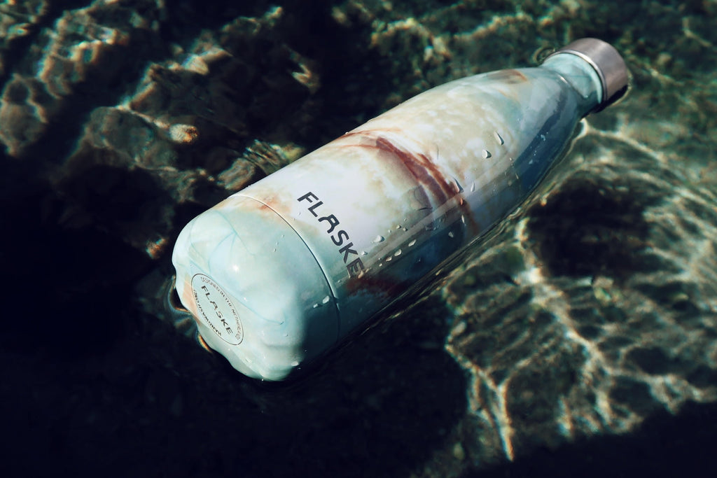 Travel with a Reusable Water Bottle - This Kind Planet