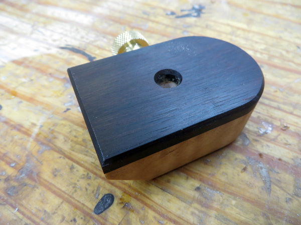 Fence for a wheel marking gauge featuring two wood types - Katalox and Cherry - and the 3/4" diameter threaded brass knob