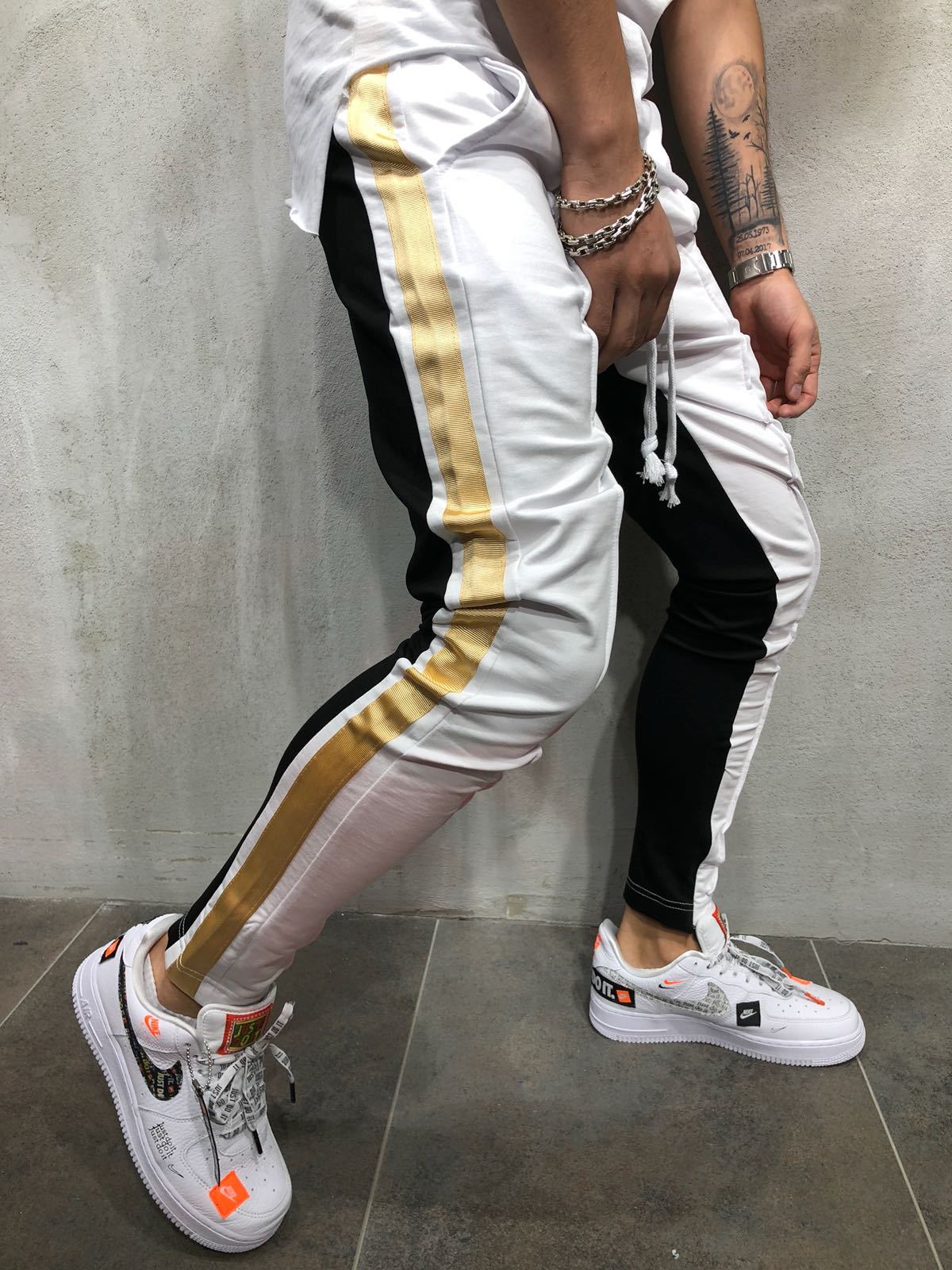 white and gold joggers