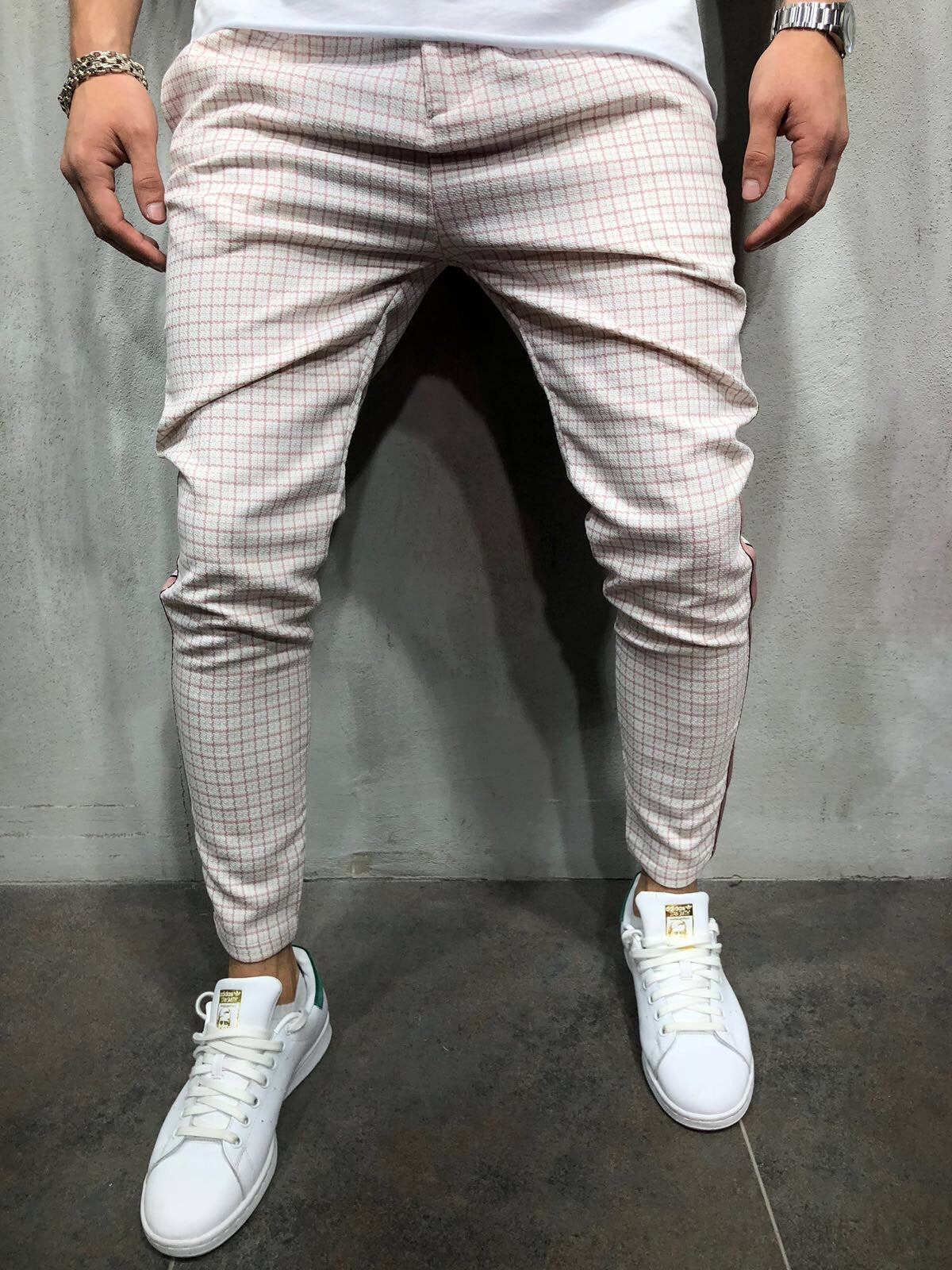 pink joggers with white stripe