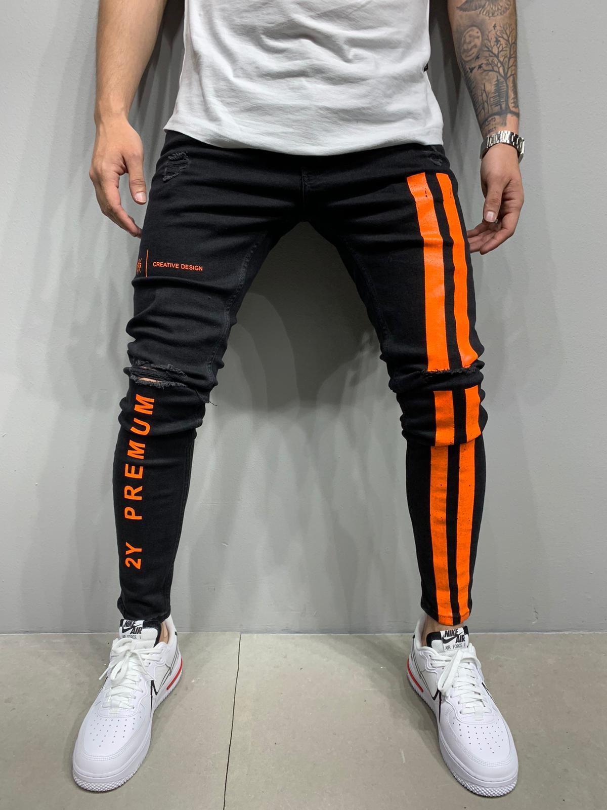 black jeans with orange stripe