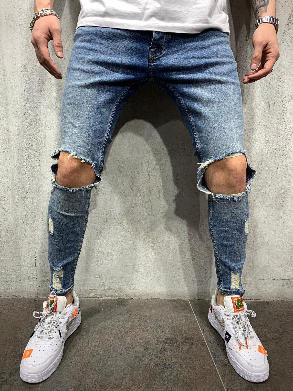 knee torn jeans mens