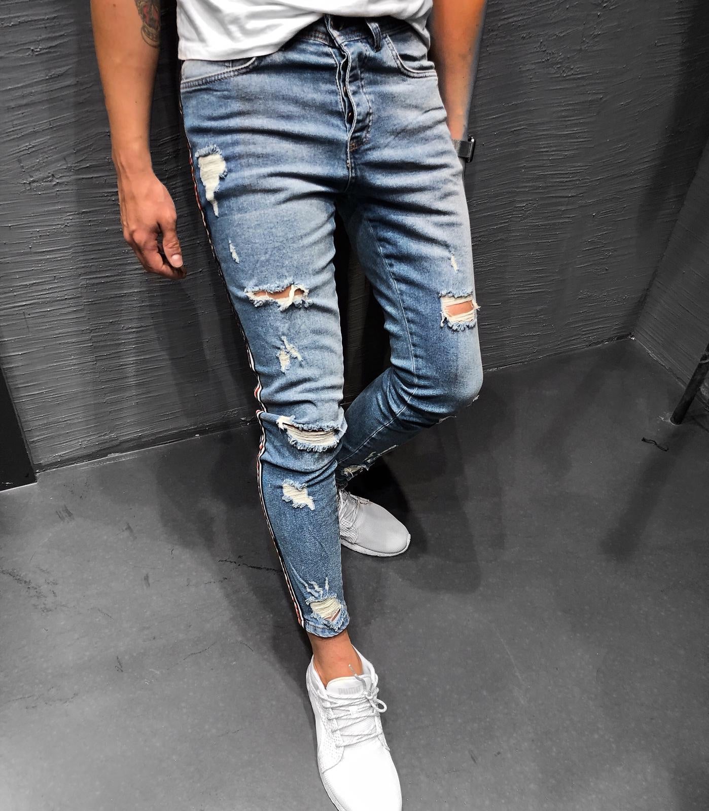 ripped jeans with side stripe
