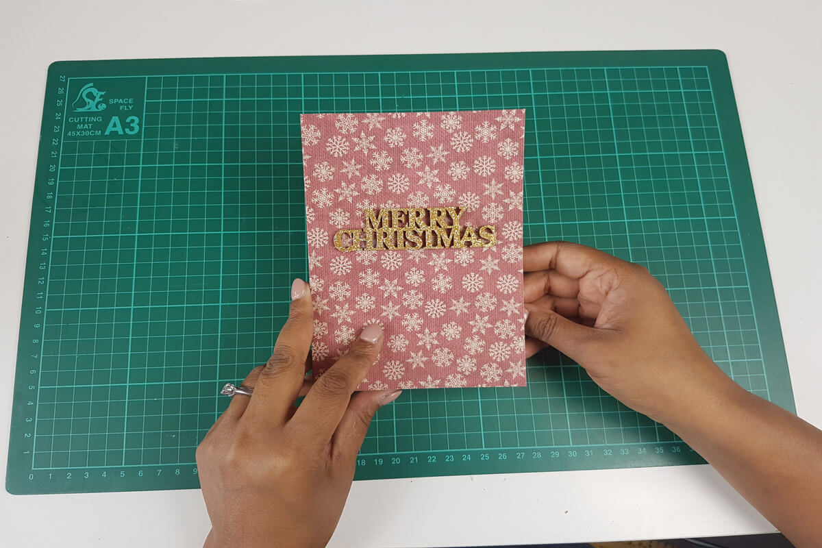 How To Make A Christmas Pop Up Card Tutorial - picture of card cover with embellishments