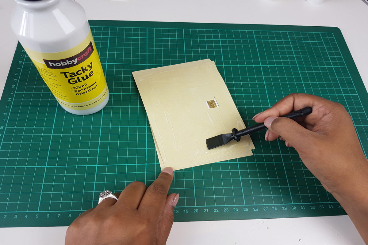 How To Make A Christmas Pop Up Card Tutorial - picture of gluing the inner cover to the outer cover