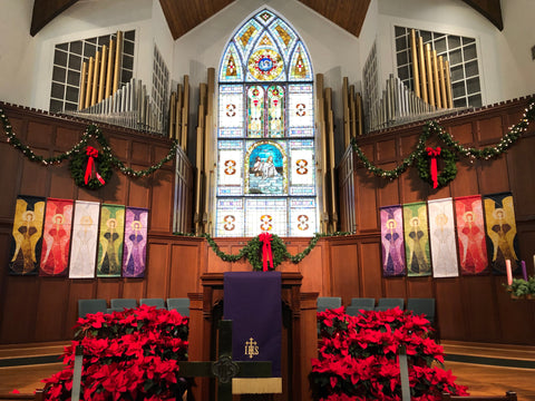 Christmas Church Altar Display with Flowers and Banners