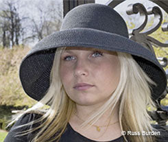 Young woman in black hat