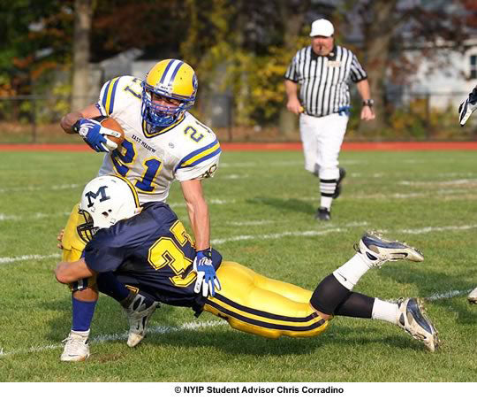 Fast shutter speed used to freeze a diving tackle