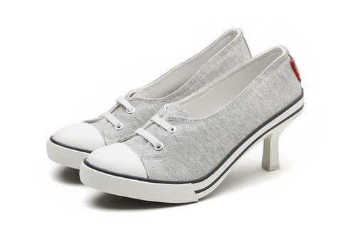 white heeled trainers
