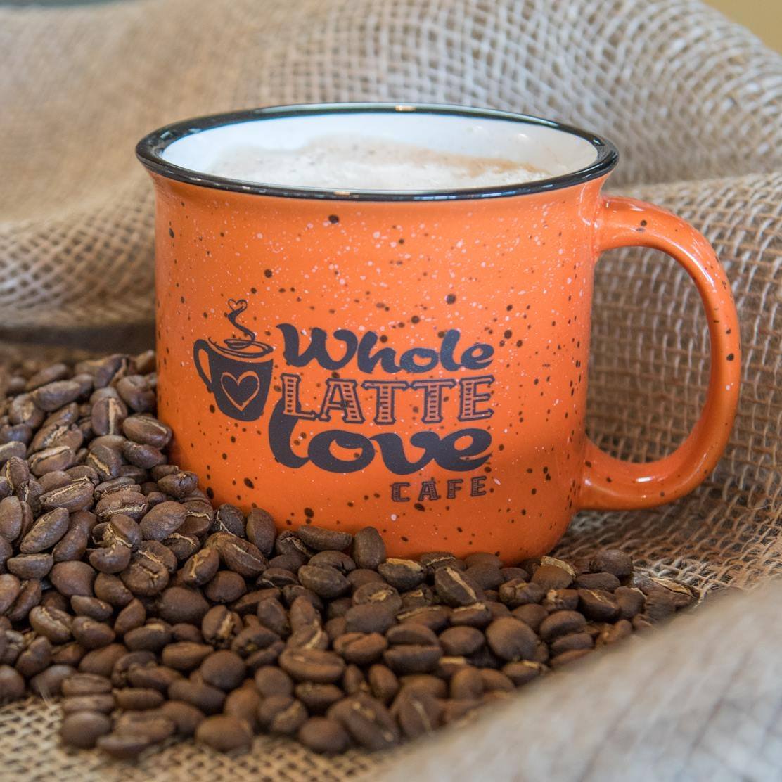a mug with the Whole Latte Love logo on it