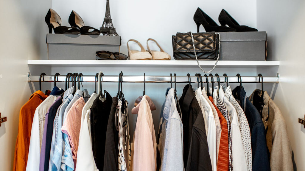 organized clothes in a closet