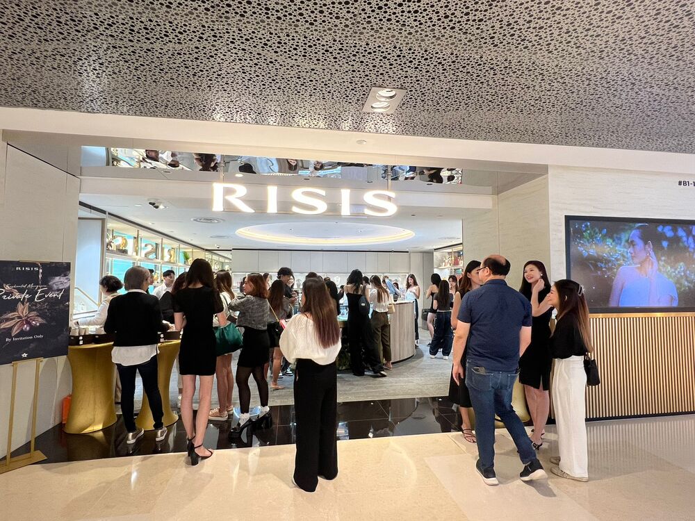 RISIS Autumn Winter 2023 Event photograph taken at RISIS flagship store entrance.