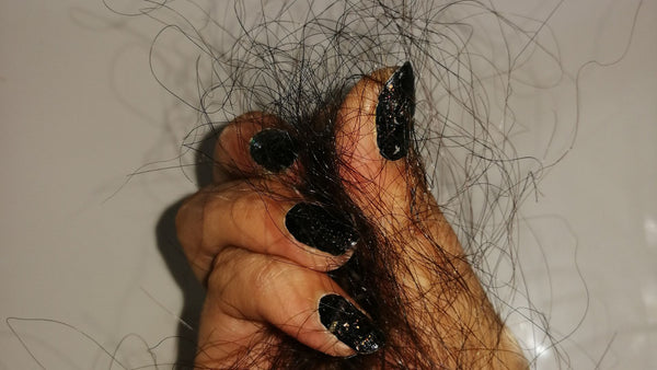 lots of hair between fingers