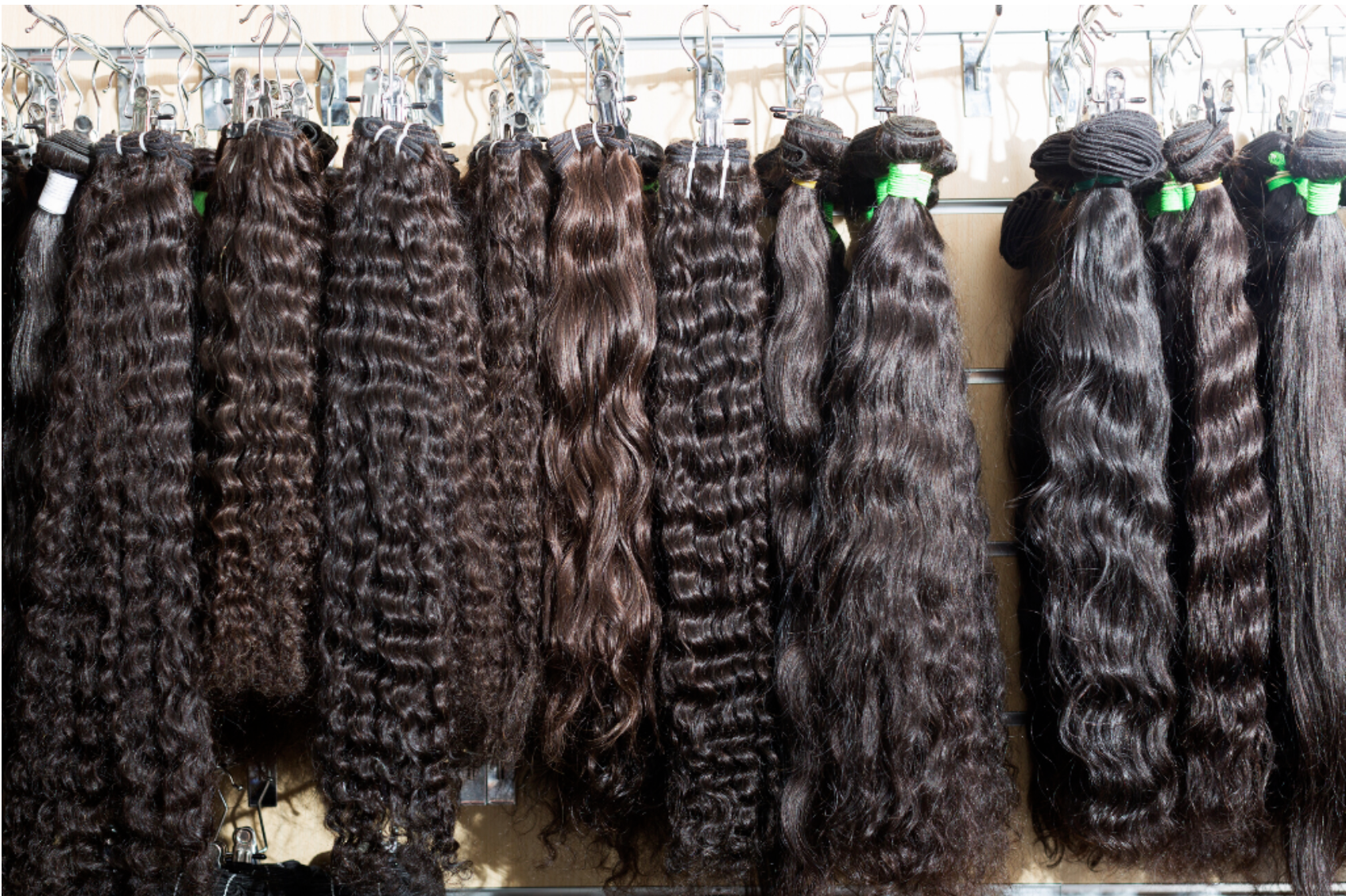 Raw Hair Extensions Hanging on Display