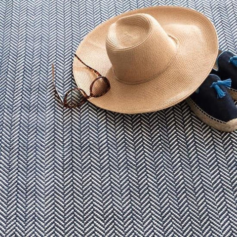 rug on floor with hat