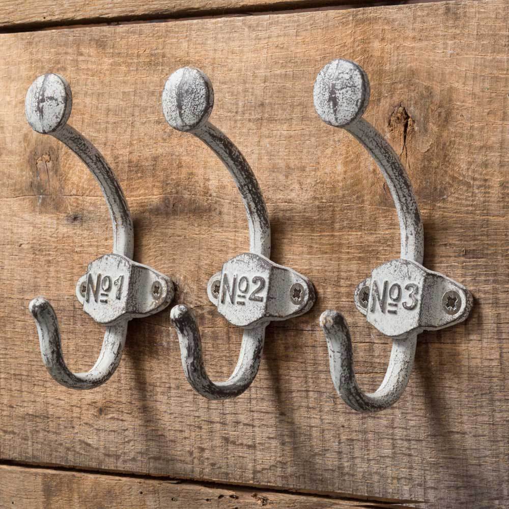 https://cdn.shopify.com/s/files/1/0091/7294/2912/products/Cast_Iron_Numbered_Wall_Hooks_Set_2_1600x.jpg?v=1661705592