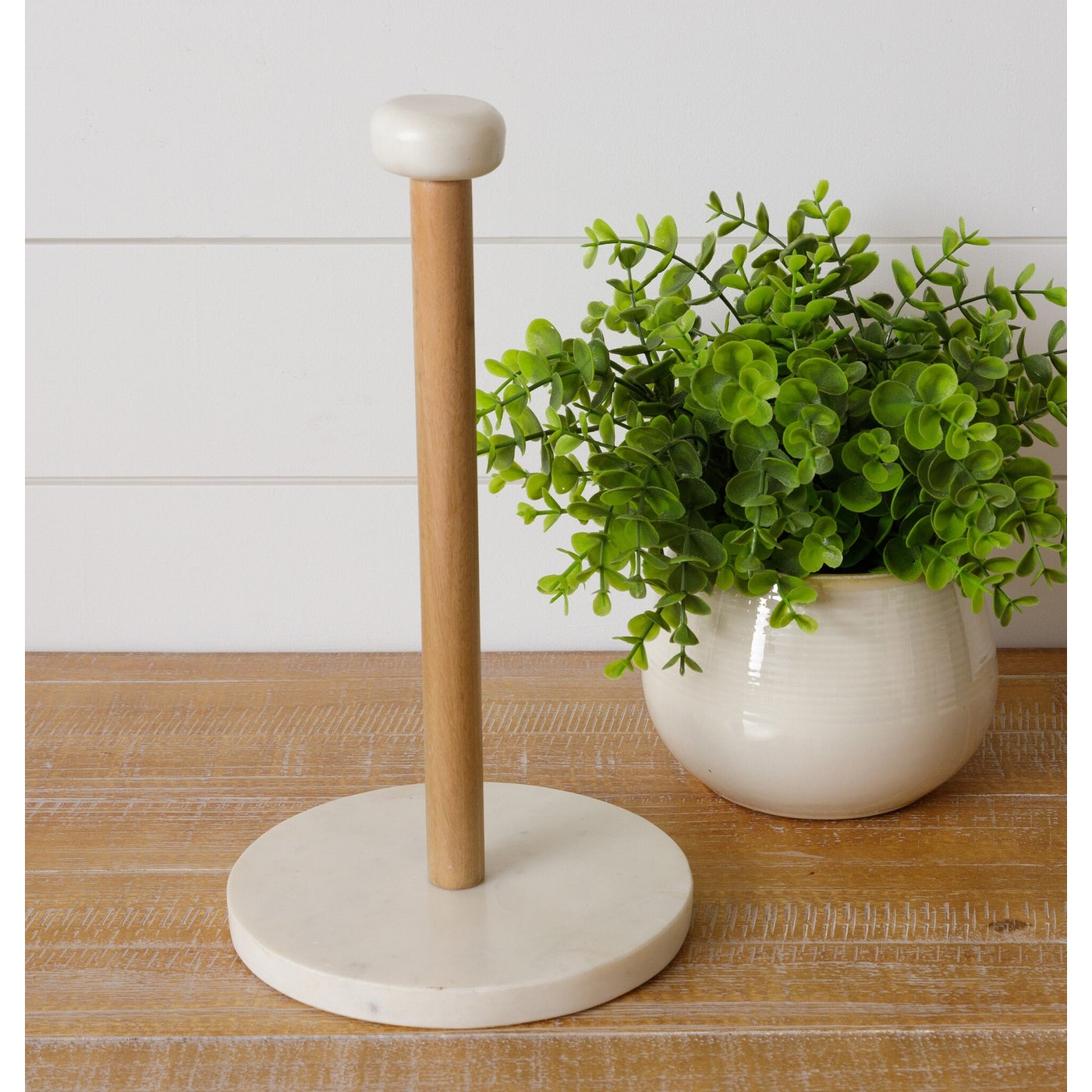https://cdn.shopify.com/s/files/1/0091/7294/2912/products/Marble_And_Wood_Paper_Towel_Holder_7_1600x.jpg?v=1661693345