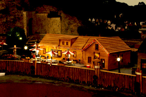 Using fiber optics to light trees, tables, and building - my HO Scale English pub on my model railroad.