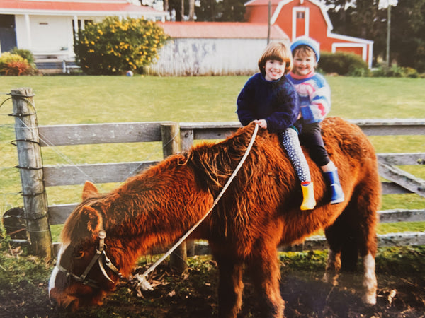 Sarah as a child on her grandparents farm in New Zealand