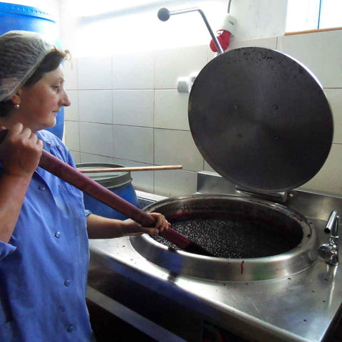 Boiling and stirring the fruit jam