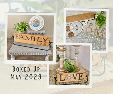 Family and Love spelled out on a rotating sign displayed on a farmhouse riser