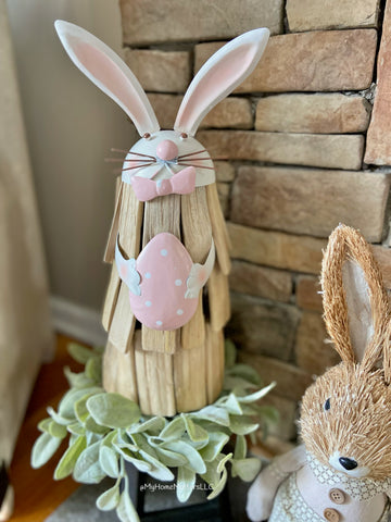Decorative Easter bunny sitting on greens