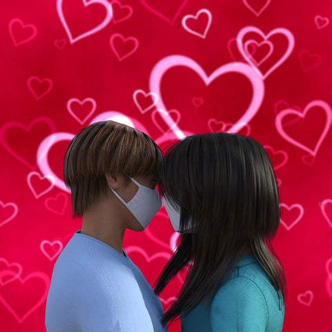 Man and woman in light blue shirts wearing masks kissing in front of a red background covered with pink stars