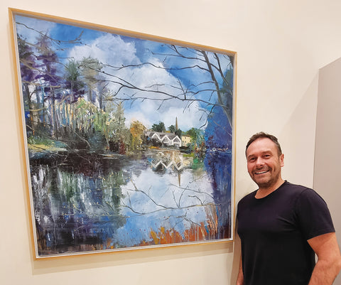 Artist Stephen Whalley with his painting of Hillsborough Castle Lake