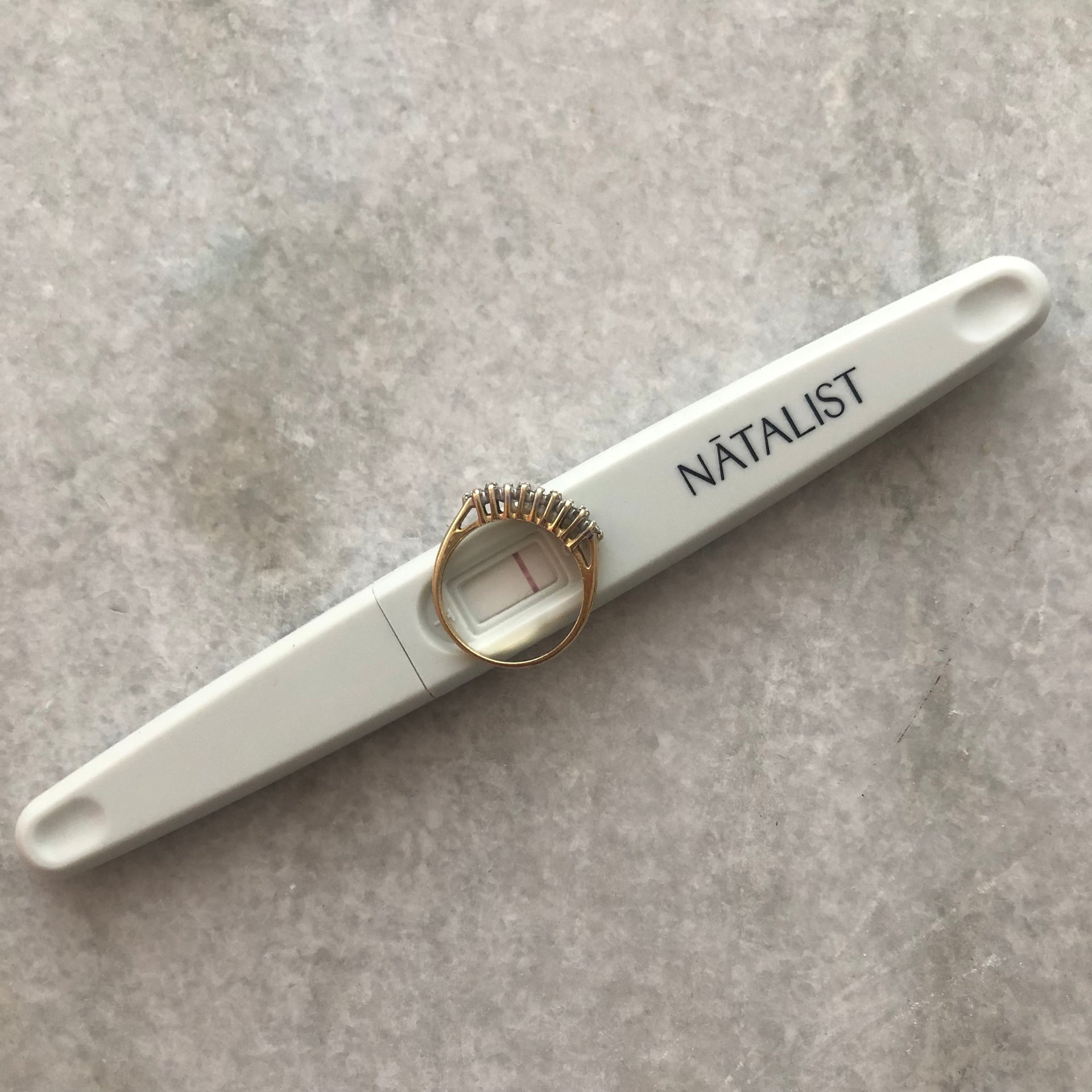 Q A Why Do People Put A Wedding Ring On A Pregnancy Test In Photos Natalist