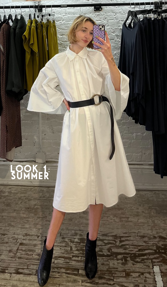 Leah wearing the Gathered Neck Dress in white with the Josie Belt and black boots.