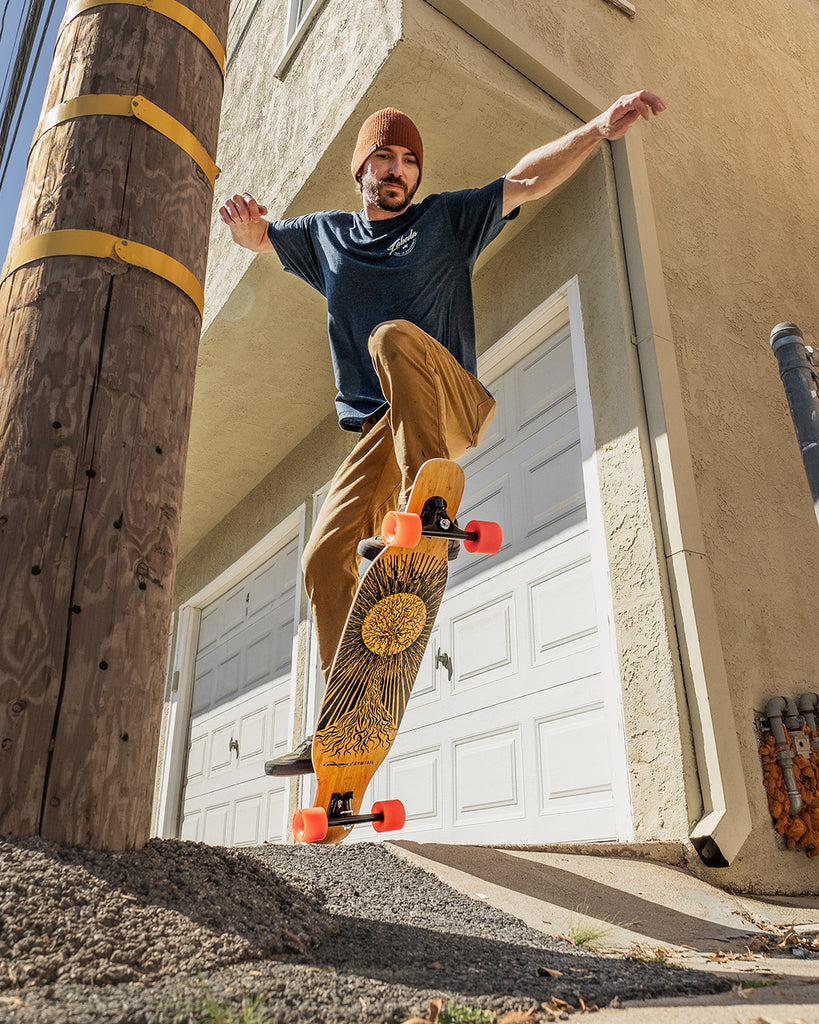 Dustin Hampton with the Loaded Symtail longboard skateboard