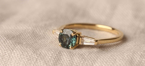 The Jessica engagement ring by EC One handmade in recycled gold with ethical sapphire and conflict free diamonds