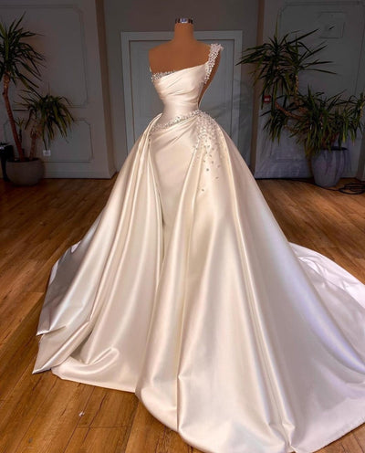 HW417 One Shoulder Pearls beaded wedding Gown with overskirt ...