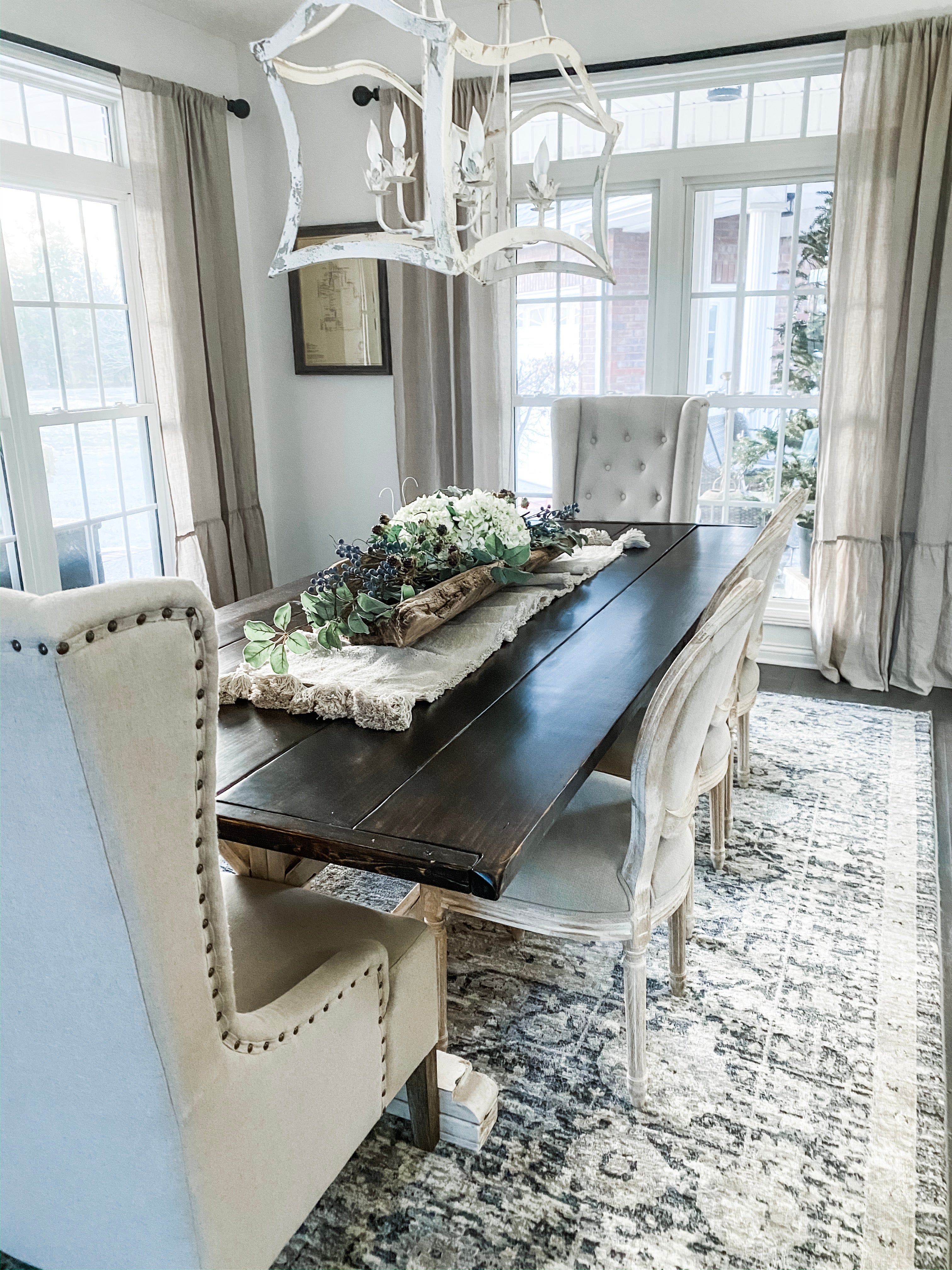 glass dining table with stainless steel legs